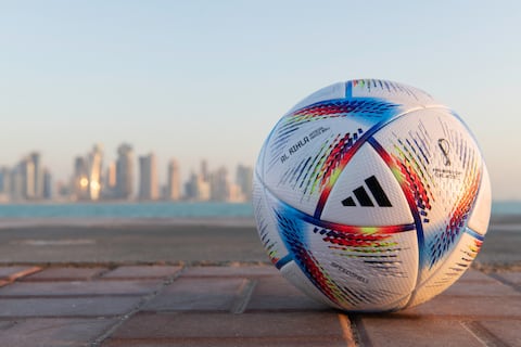 This handout picture made available by FIFA on March 30, 2022 shows Al Rihla (which means "the journey" in Arabic), the official match ball for the FIFA World Cup Qatar 2022. - FIFA launched the 2022 World Cup ball for the finals in Qatar, promising it would travel faster in the air than any ball in the history of the competition.
The ball made by Adidas is called Al Rihla, which means "the journey" in Arabic, and its design "is inspired by the culture, architecture, iconic boats and flag of Qatar", FIFA said in a statement (Photo by MOHAMED ALI ABDELWAHID / FIFA / AFP) / RESTRICTED TO EDITORIAL USE - MANDATORY CREDIT "AFP PHOTO / FIFA " - NO MARKETING NO ADVERTISING CAMPAIGNS - DISTRIBUTED AS A SERVICE TO CLIENTS